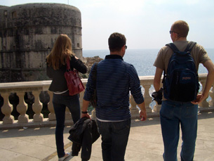 Milda, Mario and Jay looking out to the sea and one corner of Dubrovnik's fortified walls
