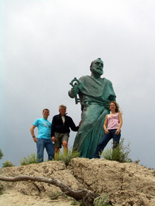 Kevin, Dad Klocke and Kelly by statue in park in Makarska